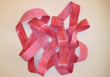 Polypropylene sculpture featuring sharp folds and layered textures.