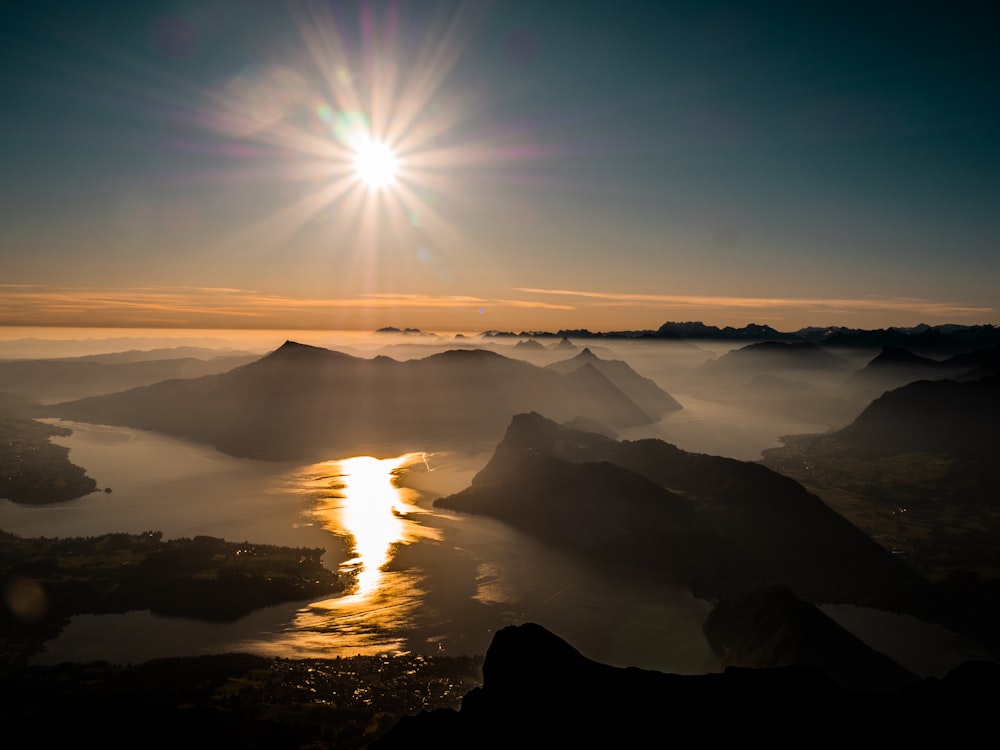 silhouette of mountains during sunset