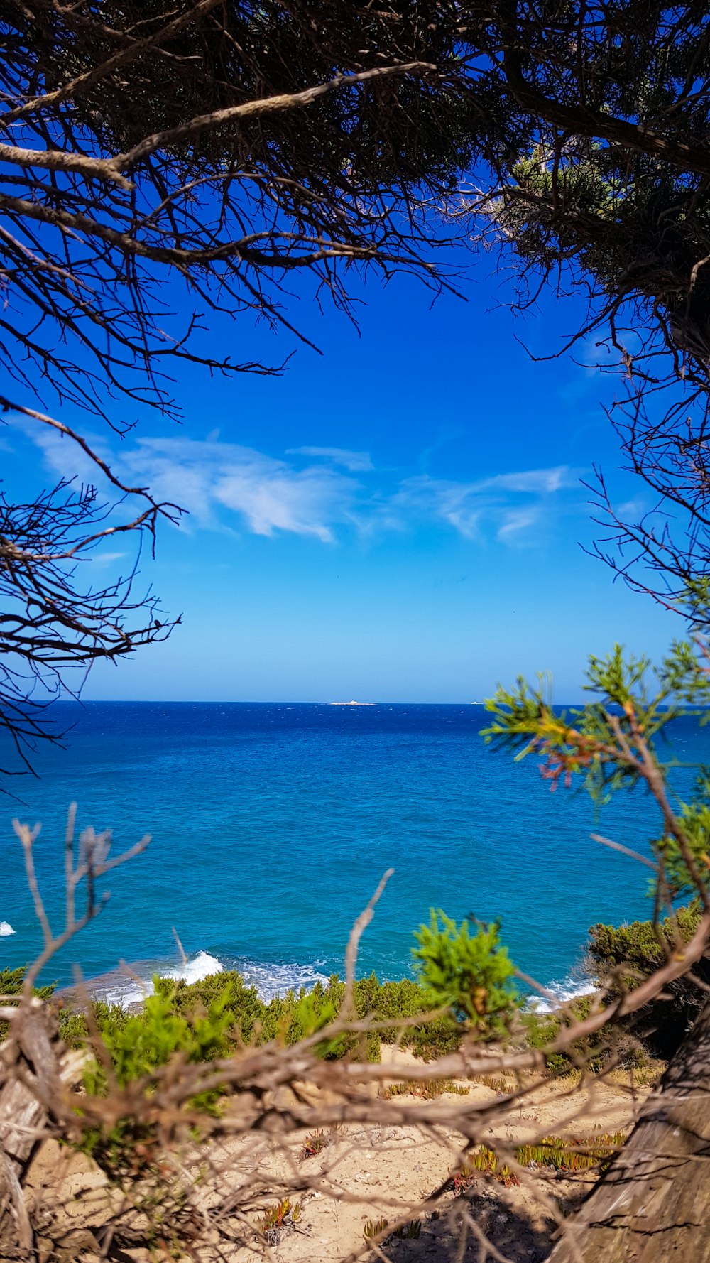 blue sea under blue sky during daytime