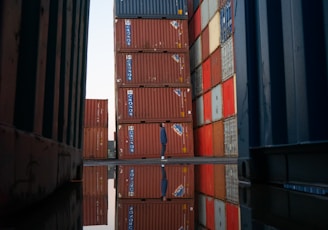 red and blue cargo containers