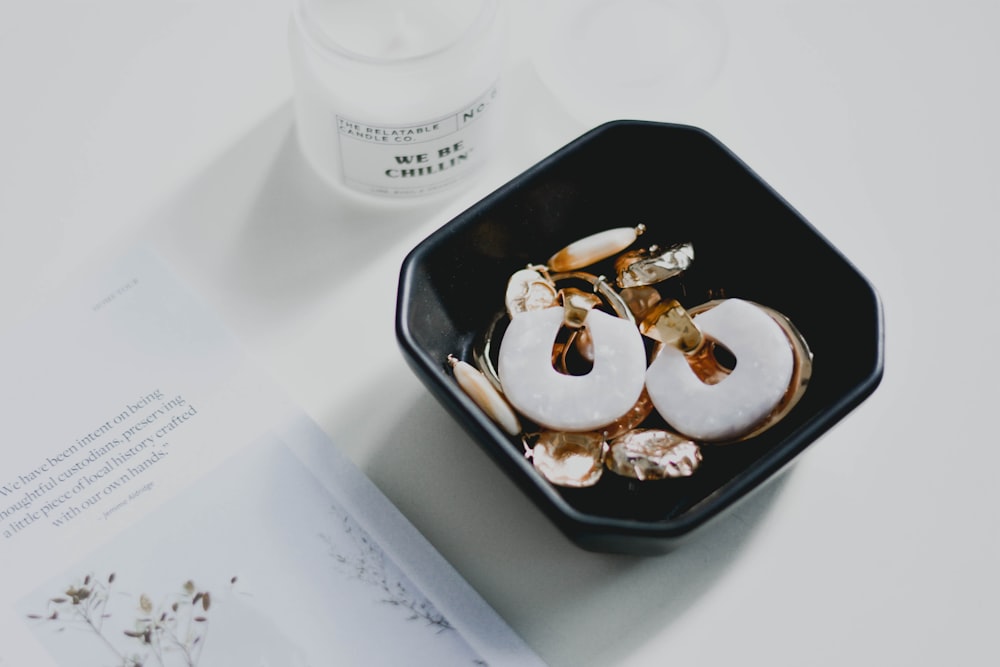 white plastic cup on black tray