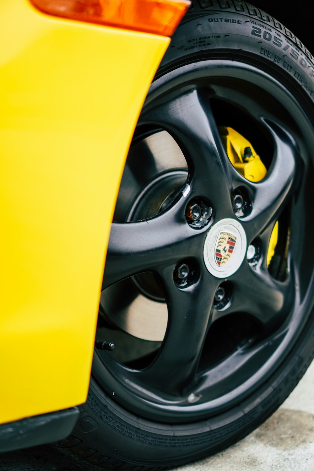 yellow and silver car wheel