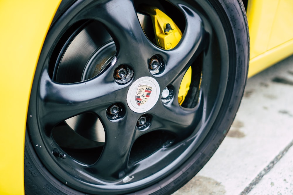 black and yellow car wheel