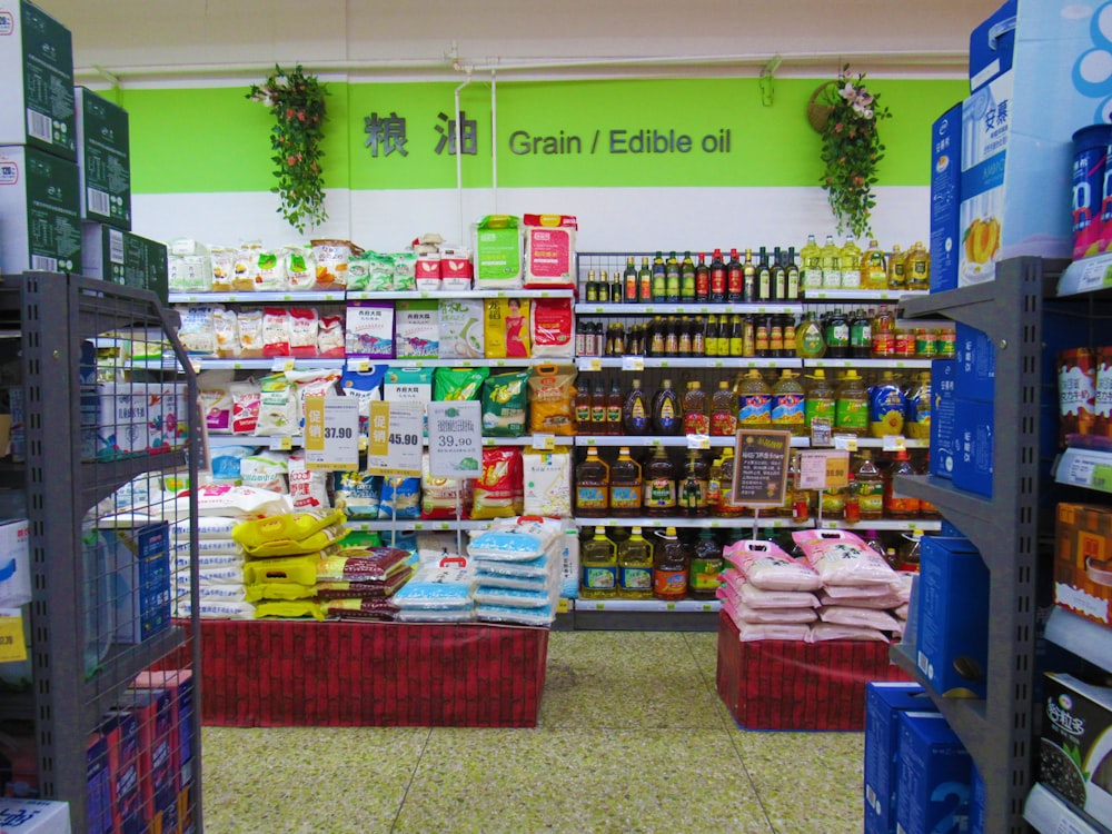 green and white store signage