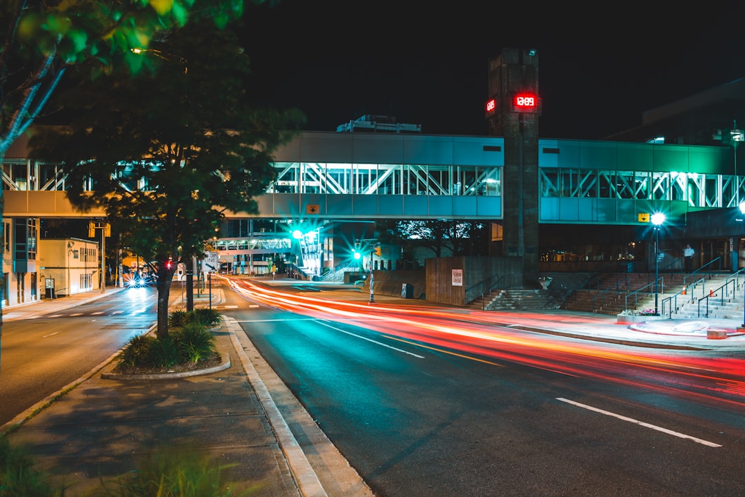 time lapse photography of cars on road during night time