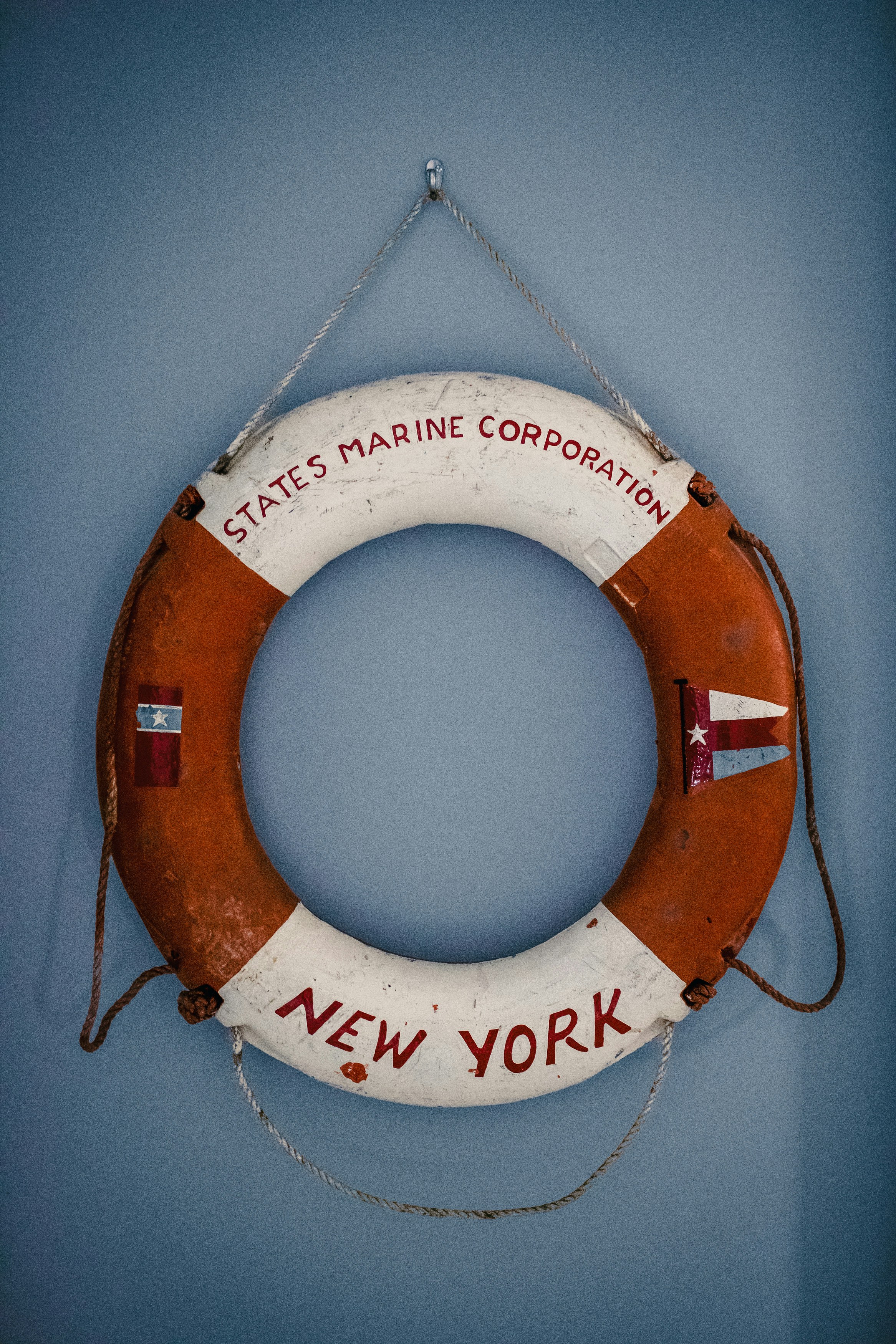 white and brown round frame