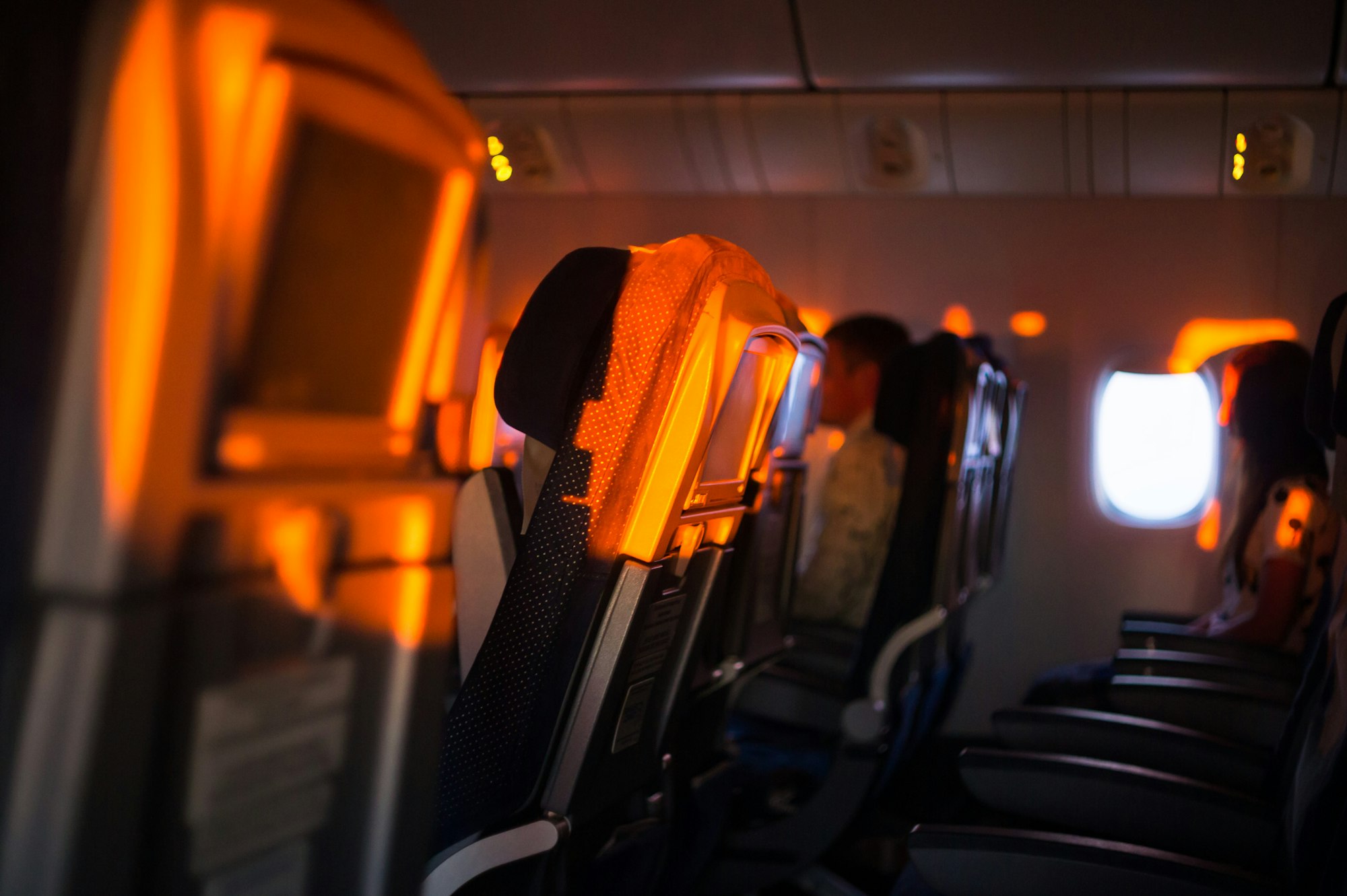 Sunset light falling on empty seats in the plane