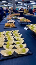 A colorful assortment of vegan appetizers displayed on a stylish buffet table ready for serving.