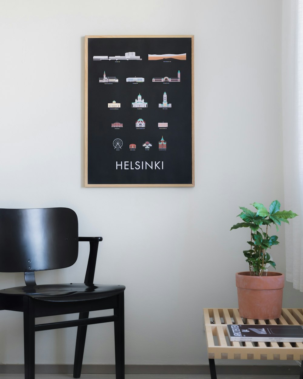 black wooden chair near green plant