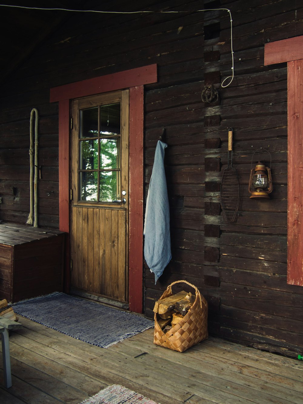 brown wooden door with gray textile hanging on it