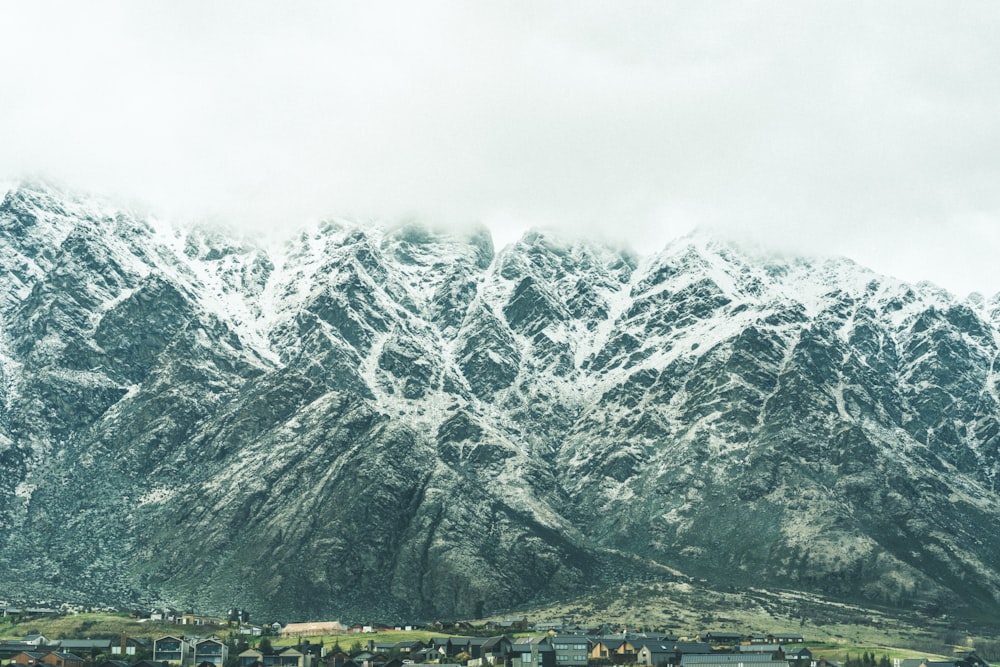 snow covered mountain during daytime