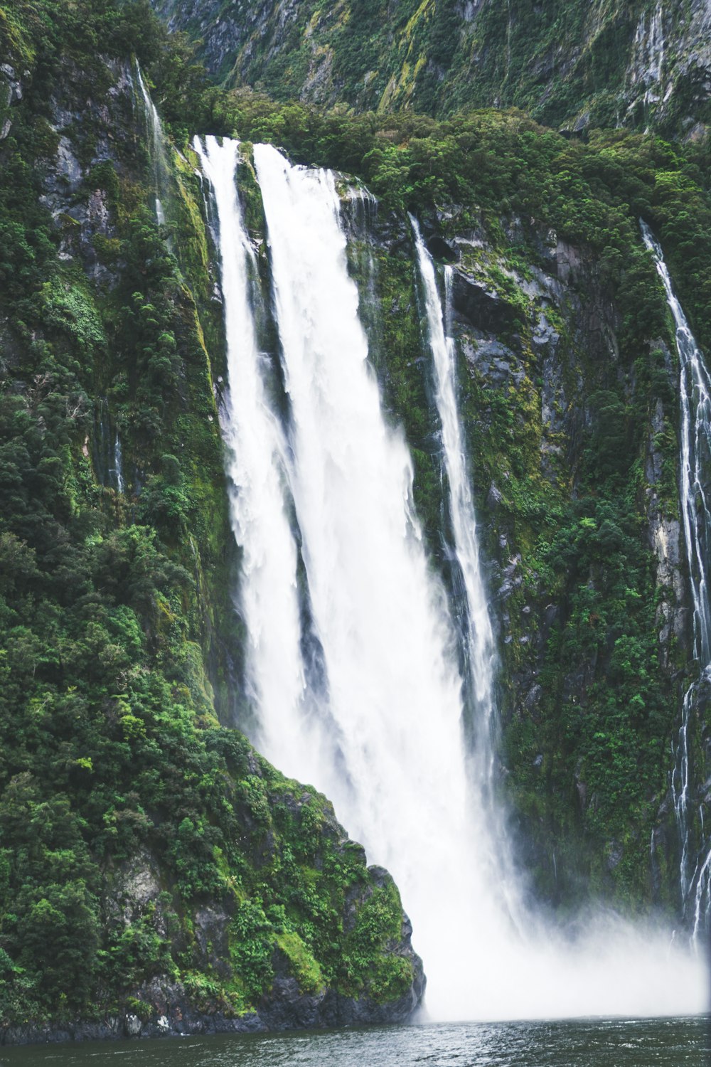 waterfalls in the middle of the forest