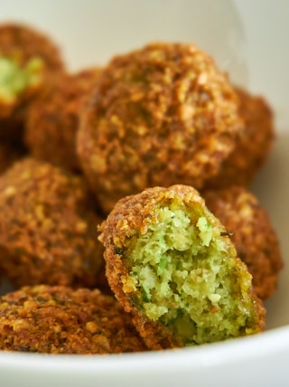 fried food on white ceramic bowl