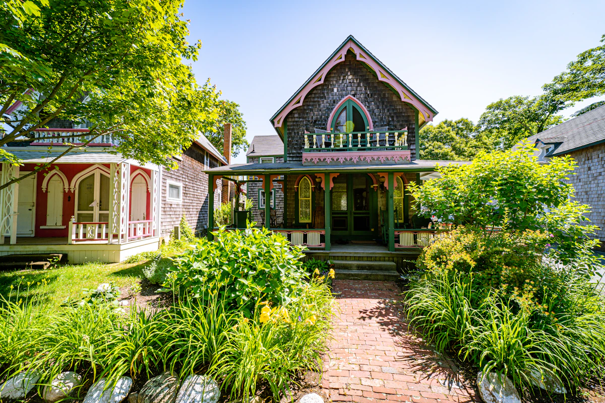 Clean brick walkway leading to a Massachusetts cottage