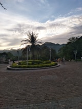 Residents enjoying a morning walk along the landscaped gardens and walking paths at Eldeco 7 Peaks.