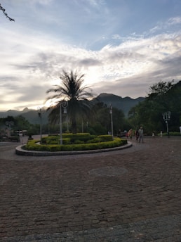 Residents enjoying a morning walk along the landscaped gardens and walking paths at Eldeco 7 Peaks.