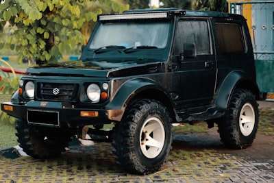 black jeep wrangler on road during daytime suzuki google meet background