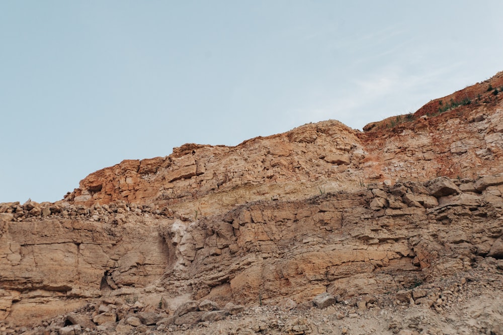 brown rock formation under blue sky during daytime