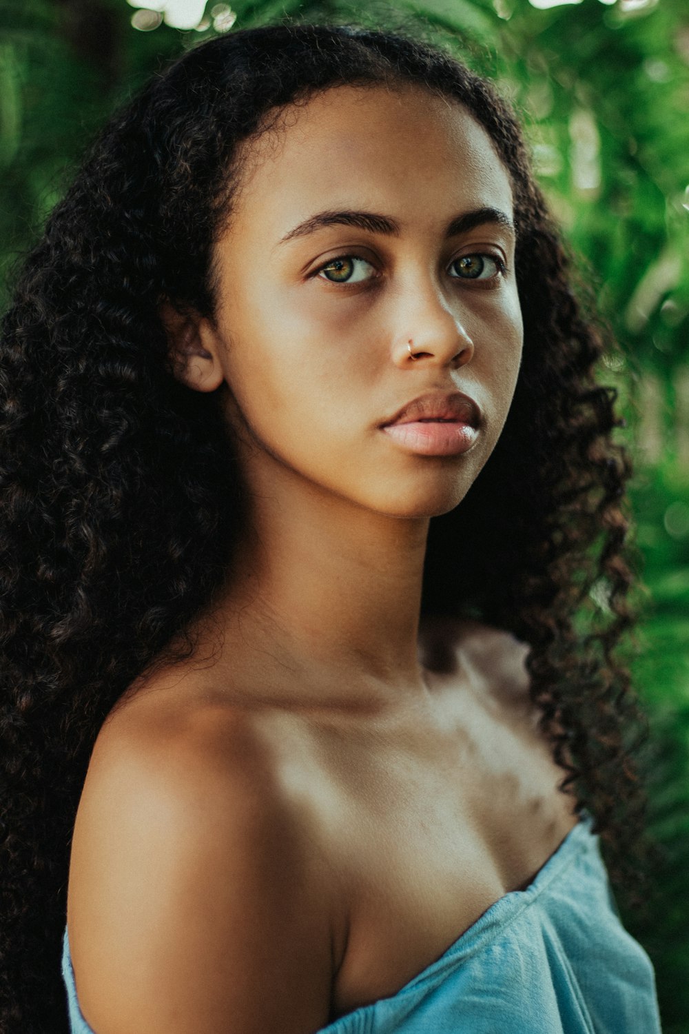 woman with black curly hair