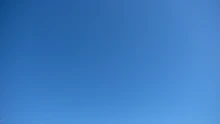 A clear blue sky with a subtle gradient