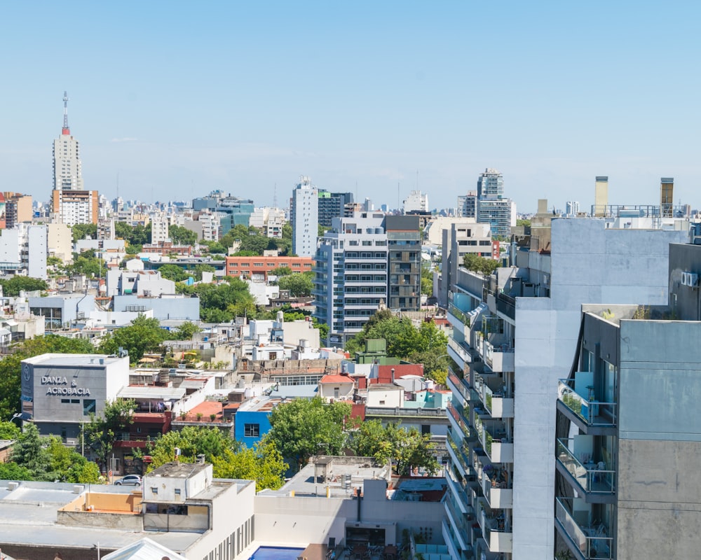 city buildings under blue sky during daytime