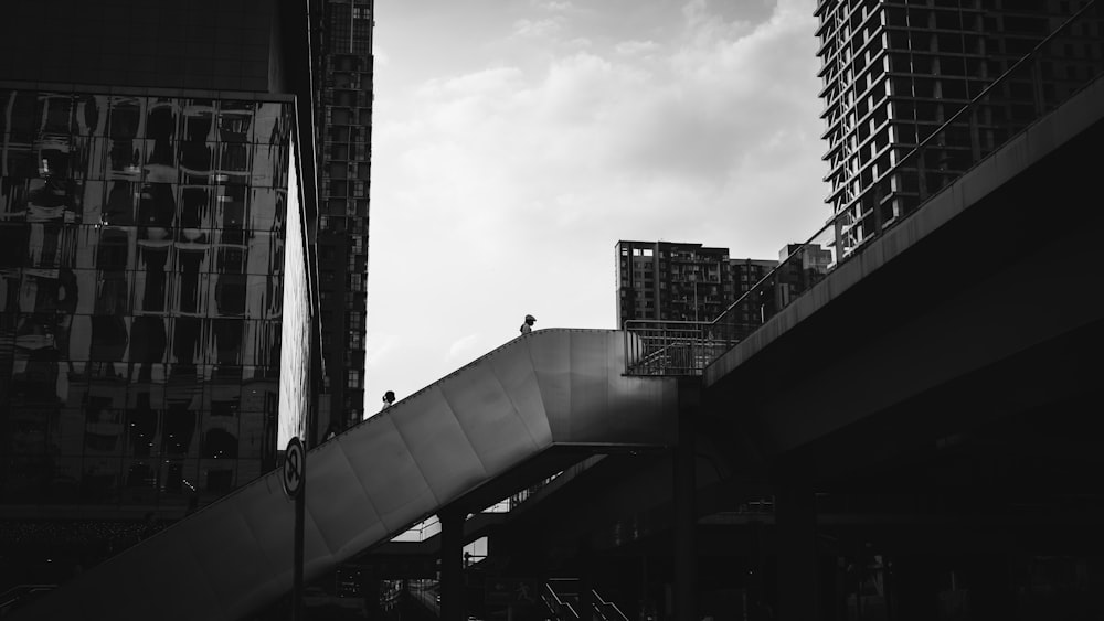 grayscale photo of high rise building