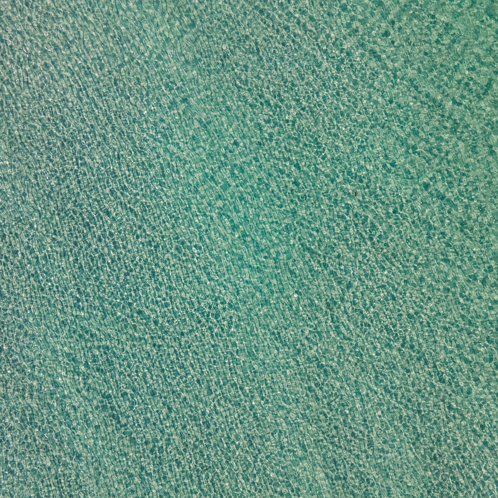 textil verde en primer plano
