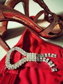 A pair of elegant heeled boots in deep burgundy.