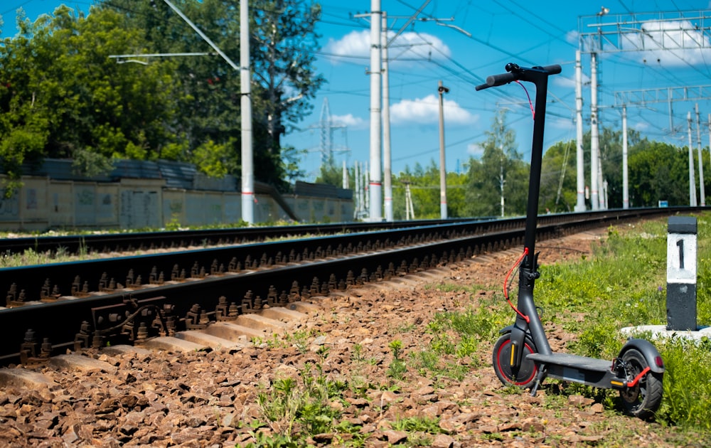 black metal train rail during daytime