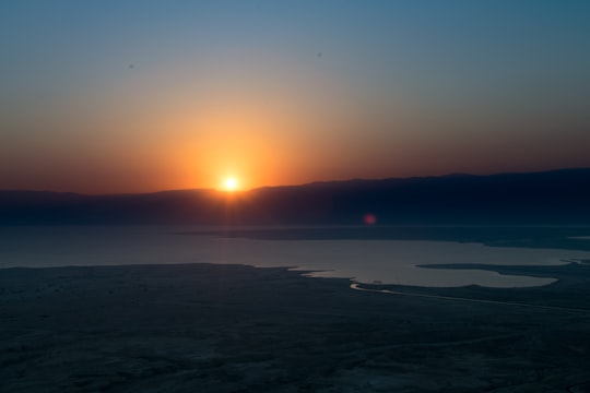body of water during sunset in Masada Israel