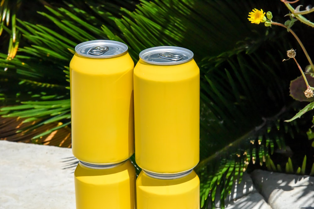 yellow and silver can on white table