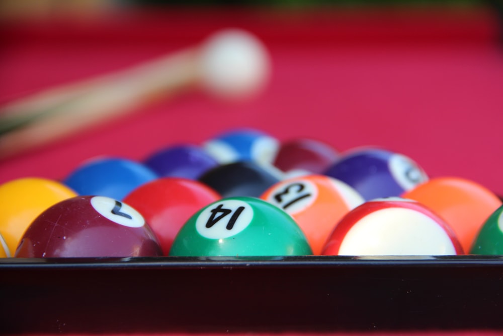 billiard balls on billiard table