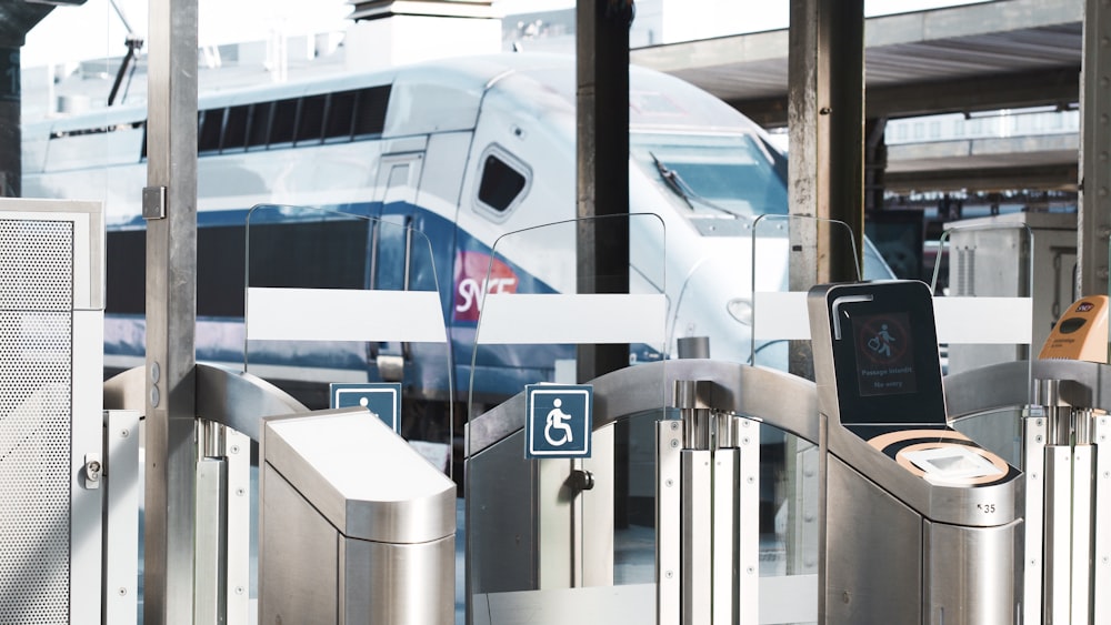 white and blue train during daytime