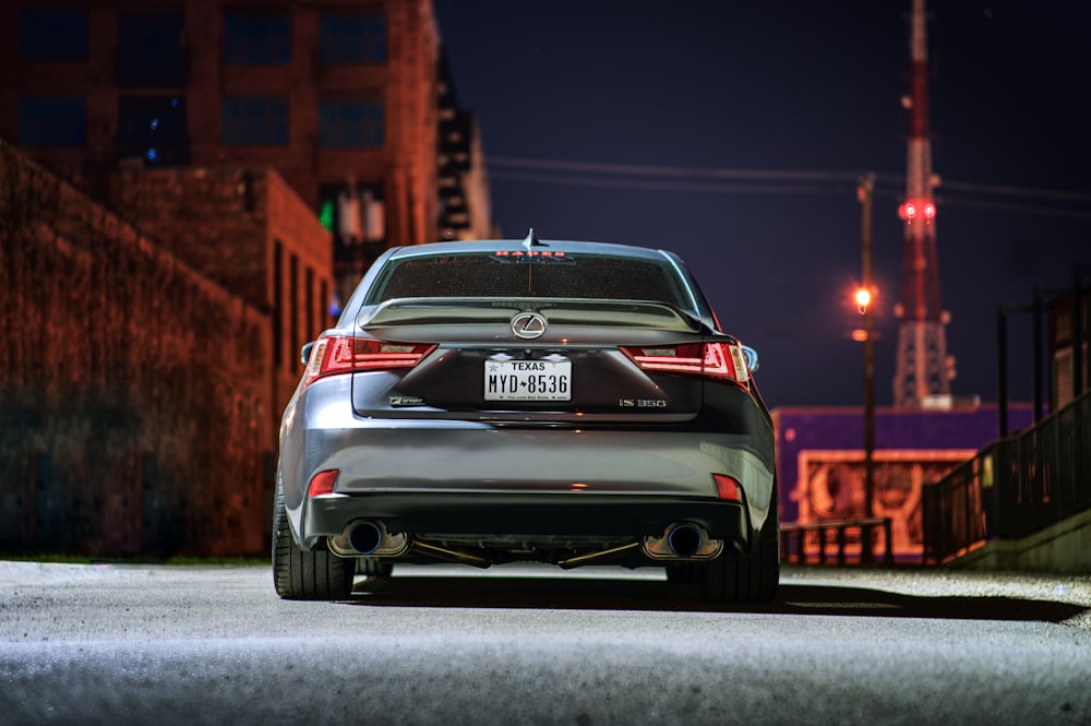 white bmw m 3 on road during night time