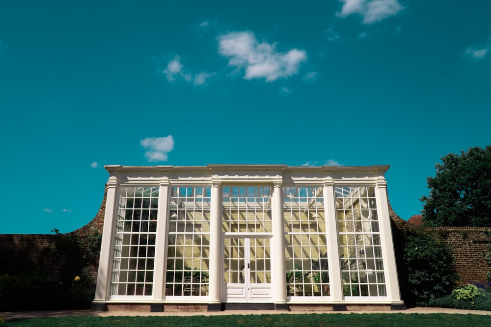 white and brown concrete building under blue sky during daytime