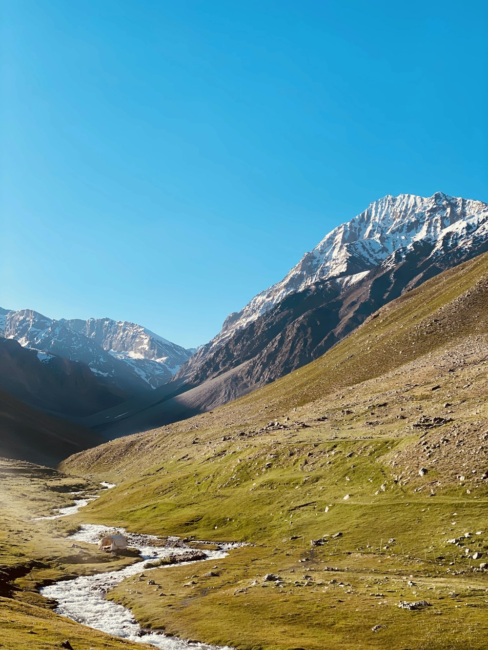 green and brown mountains under blue sky during daytime