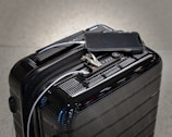 black and gray luggage bag