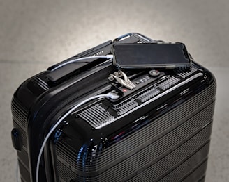 black and gray luggage bag