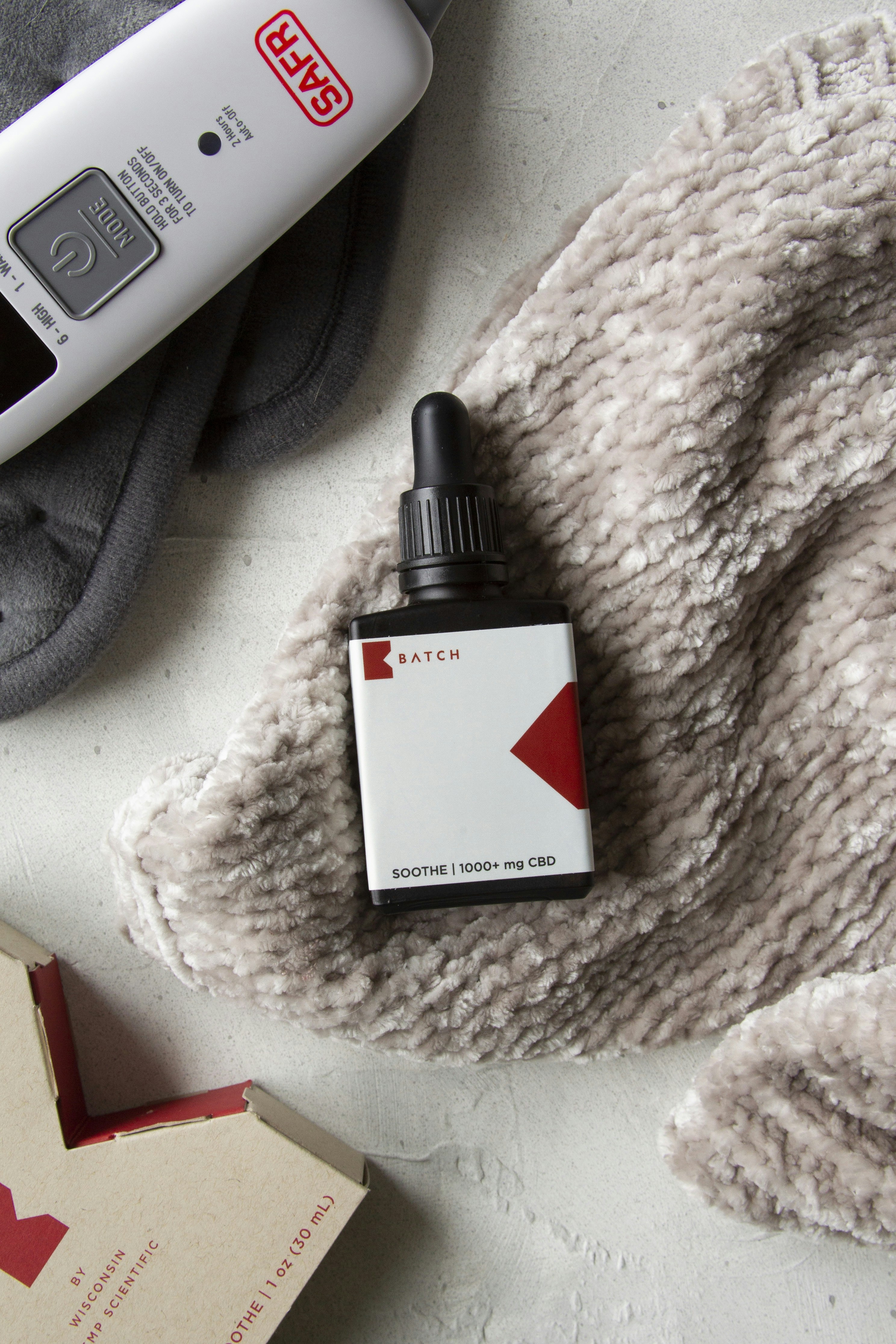 white and black labeled bottle