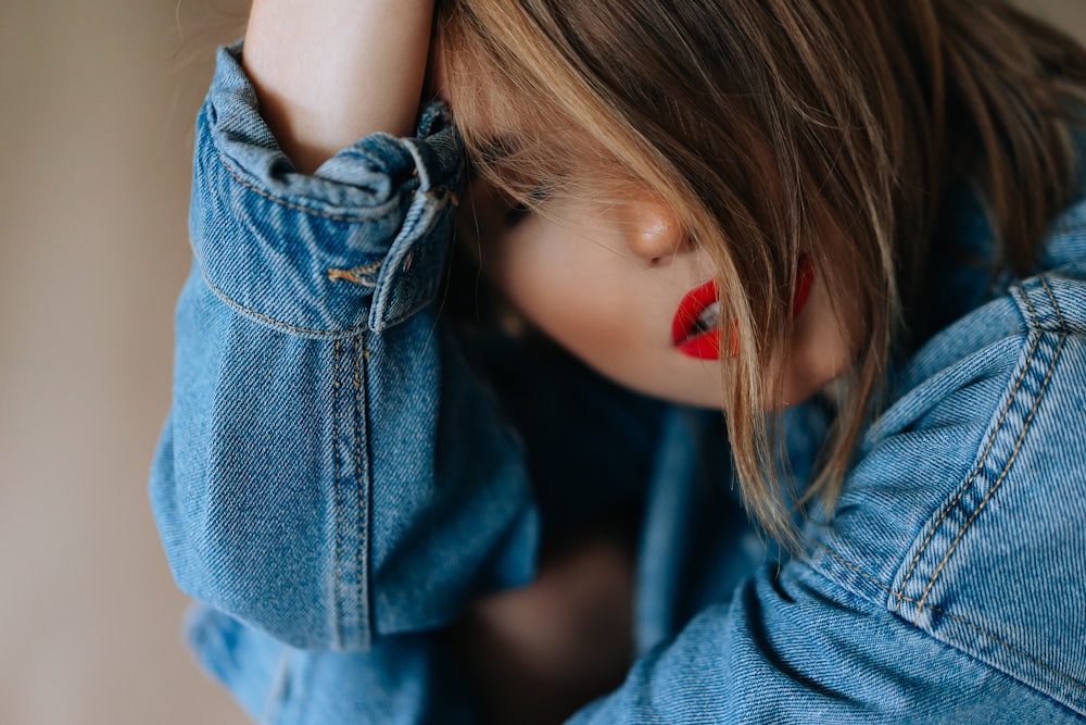 woman in blue denim jacket