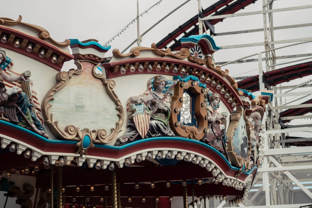 white and blue carousel under blue sky during daytime