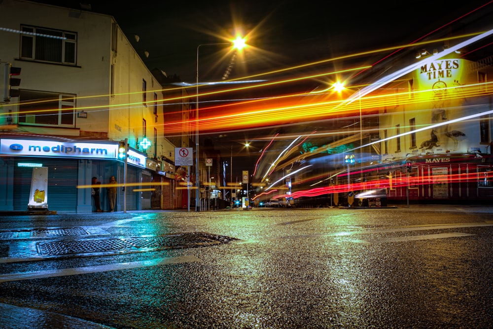 time lapse photography of cars on road during night time