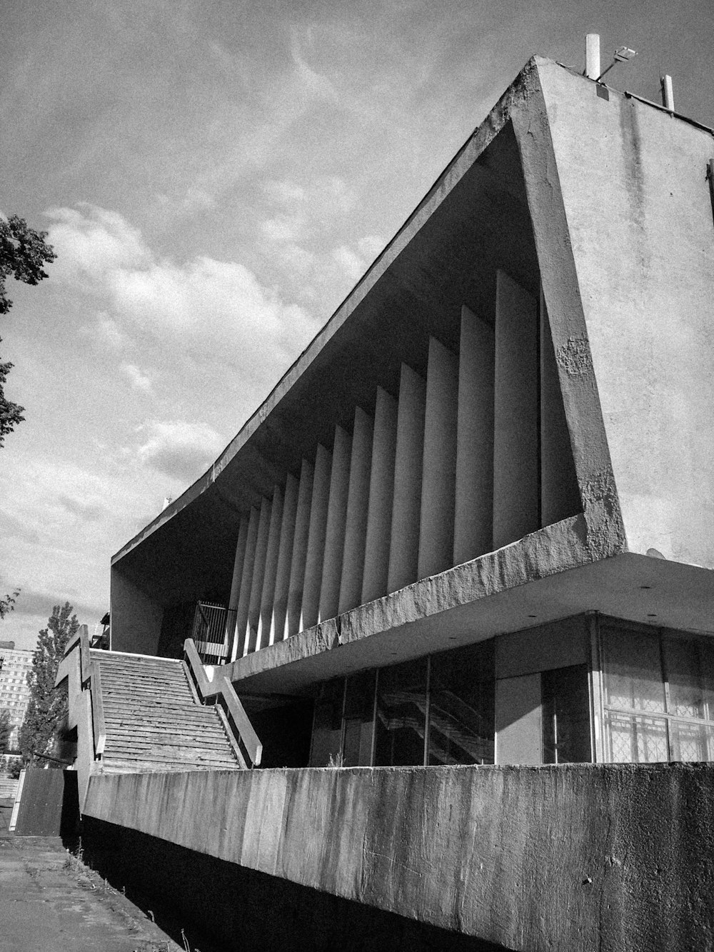 grayscale photo of concrete building