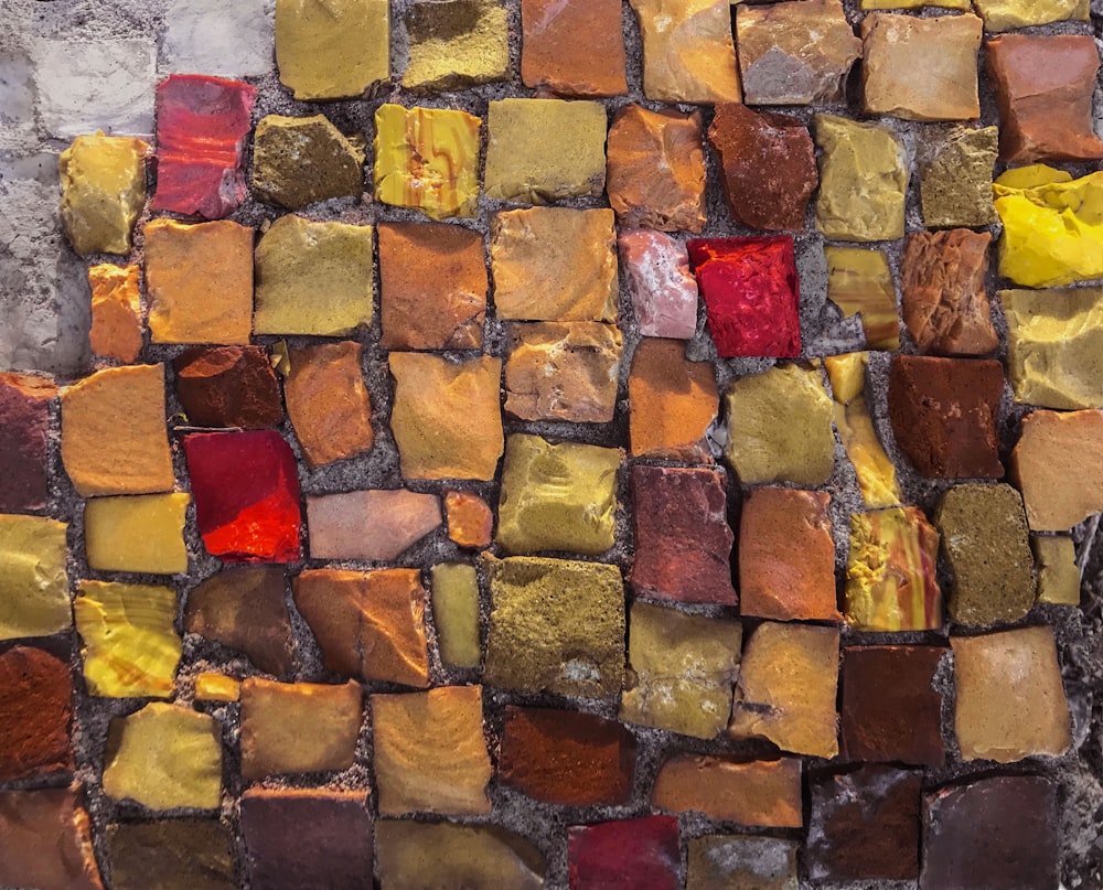 red yellow and brown brick wall