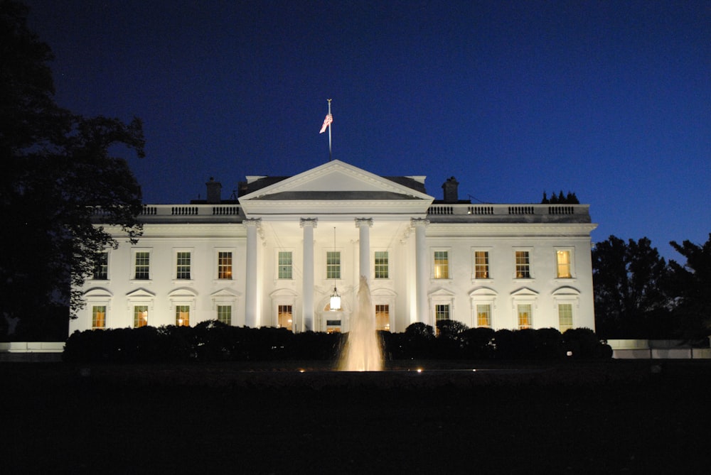 white concrete building during night time