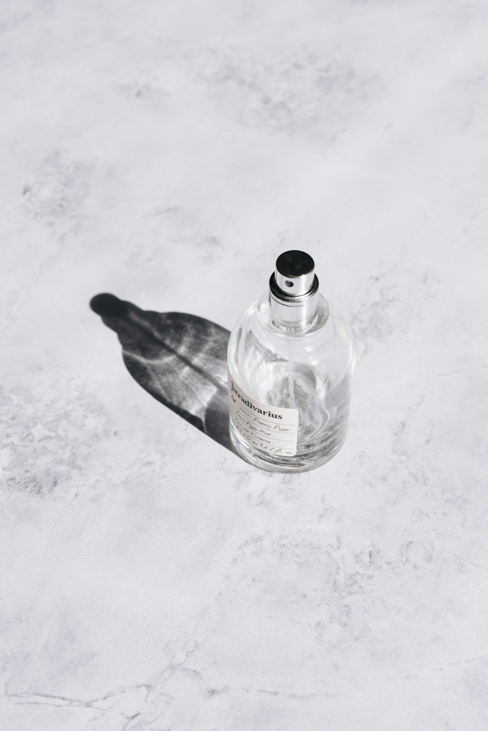 clear plastic bottle on white table