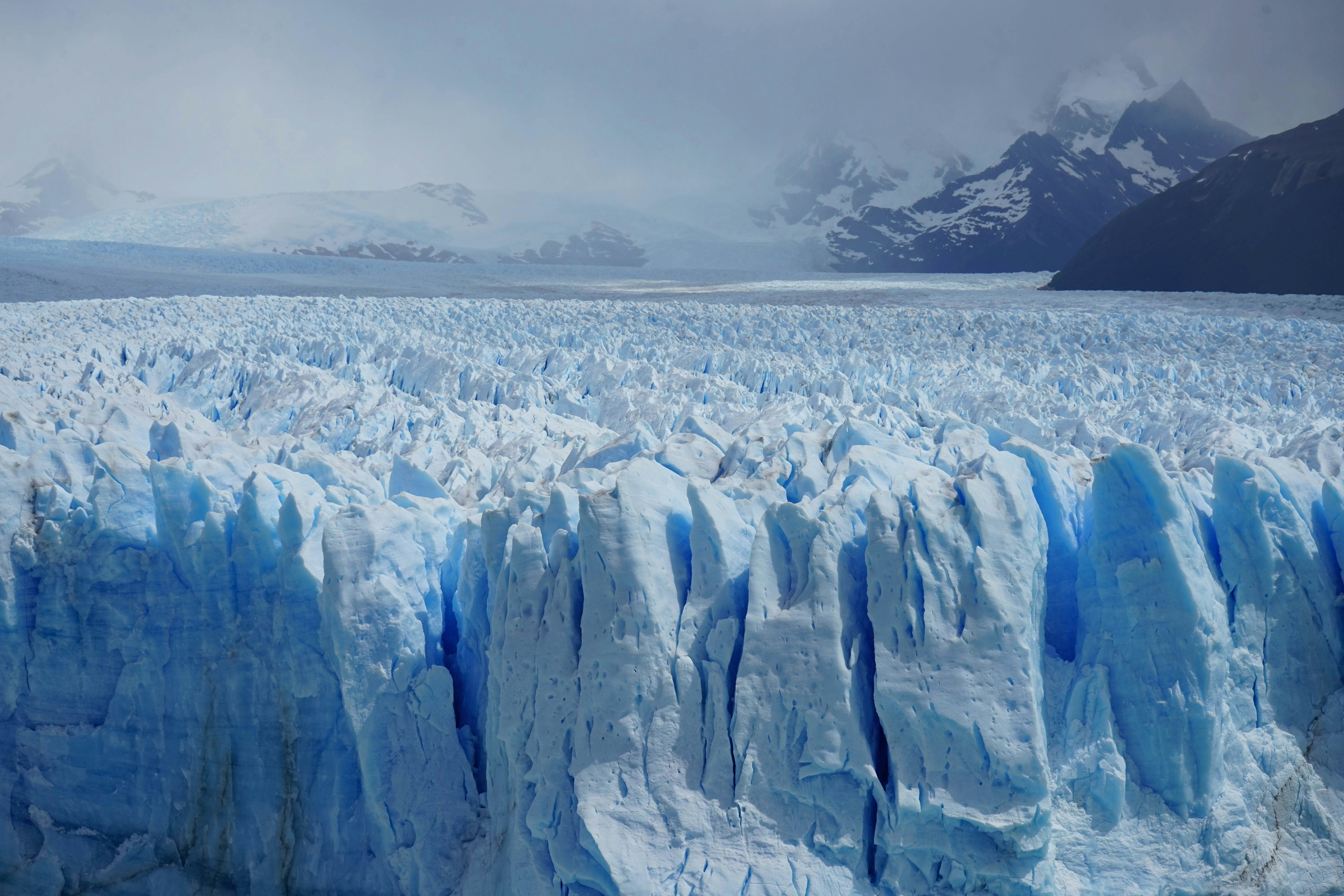 ice formation under gray sky, 