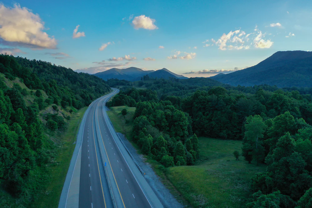 Highway winding through the Tennessee hills at dusk