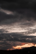 black clouds and blue sky