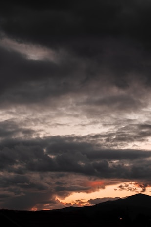 black clouds and blue sky